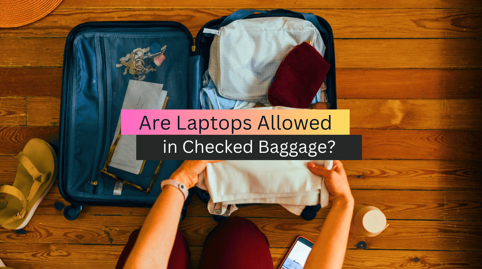Are Laptops Allowed in Checked Baggage? (2023 Guide)
